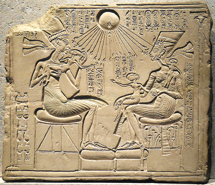 Relief sculpture from ancient Egypt of Akhenaten, Nefertiti and Three Daughters (ca. 1340 BCE). Akhenaten kisses one daughter, another is held by Nefertiti, while the third plays with Nefertiti's earring.