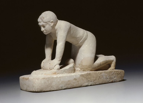 Ancient Egypt, Old Kingdom, Dynasty V, Statuette of a Woman Grinding Grain, from Giza, Tomb G2185, ca. 2500–2350 BCE. 
