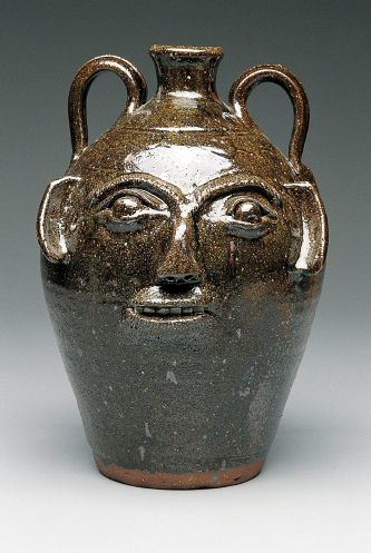 Burlon B. Craig (1914–2002, NC, US), Face Jug, ca. 1980. Stoneware. Mint Museum, Charlotte, NC. Gift of Mr and Mrs Robert Yoder. © 2012 Estate of Burlong Craig. (MIN-48)
