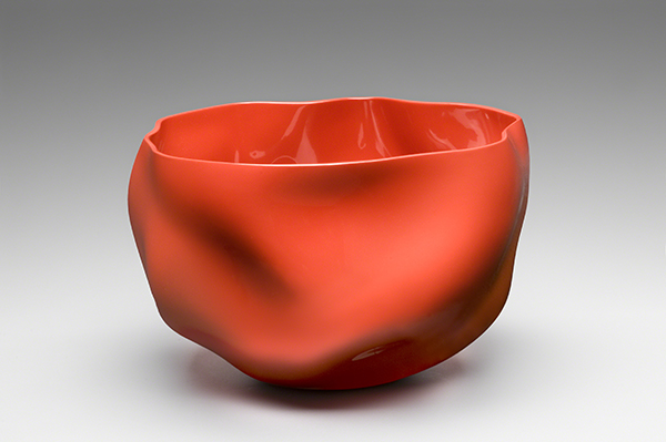 Lacquer bowl (2008) by Chung Hae-Cho. Red bowl in an organic form made from layers of lacquer.