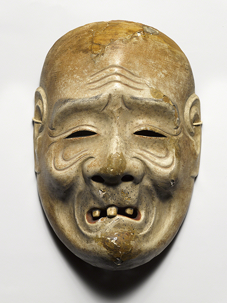 Japan, Noh Theater Beggar Mask, 1600s–1800s. Lacquered Noh theater mask in the form of a beggar with wrinkles, no hair, and missing teeth.