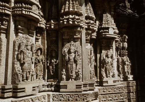  India, Prasanna Chennakesava Temple, assembly hall (mandapa) wall with images of Siva and Parvati (left) and Laksmi and Vishnu (center), Somnathapur.
