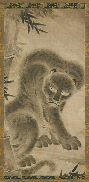 Kanō Motonobu, attributed to, Tiger. Ink and color painting of a Tiger crouching next to bamboo.