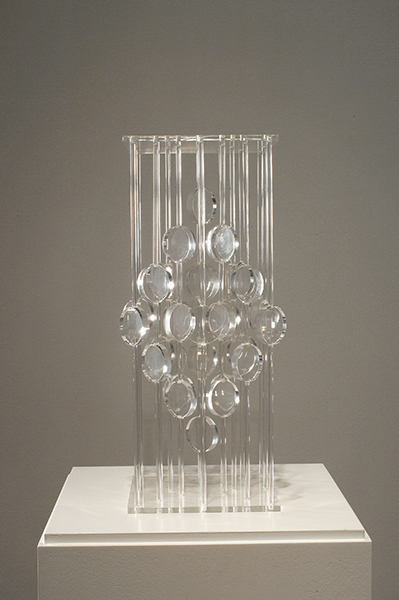 Untitled sculpture by Martha Boto (1966). Plastic spheres forming a diamond shape suspended on plastic rods.