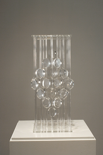 Untitled sculpture by Martha Boto (1966). Plastic spheres forming a diamond shape suspended on plastic rods.