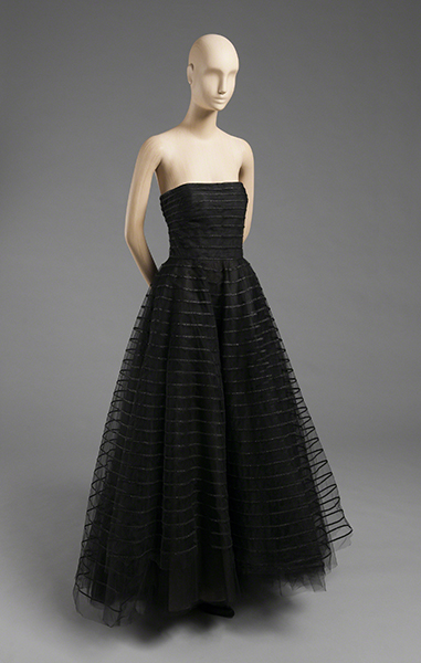Oscar de la Renta Evening Gown (2007). Strapless gown of black tulle with black horizontal lines.