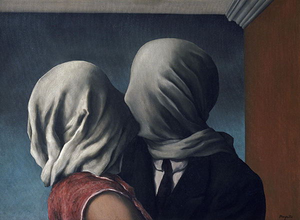 Couple wearing white fabric over their heads kissing against a blue background.