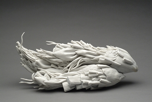 Porcelain sculpture by Tokumaru Kyoko titled Germination (2001). White, abstract, horizontal form resembling a rhizome.