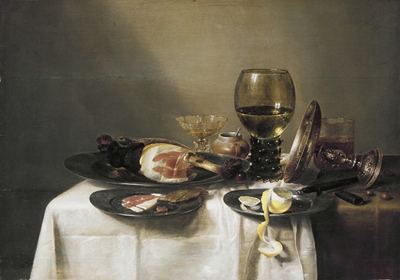 Oil painting by Willem Claesz. Heda titled Still Life with Ham and a Roemer (ca. 1631-1634). Glassware and pewter plates with ham and pealed lemon on a table covered in a white cloth.