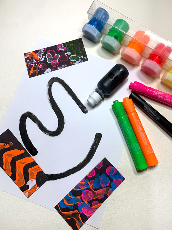 Adaptive art-making tools for students with low vision, including high-contrast and fluorescent media. Scented markers can help with identifying colors.