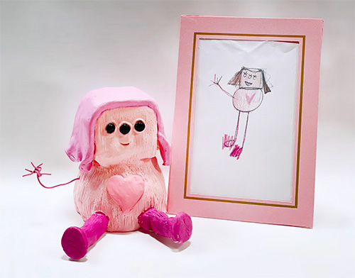 Left: Stella, ceramic sculpture grade nine. Right: Daisy, original drawing, grade one.
