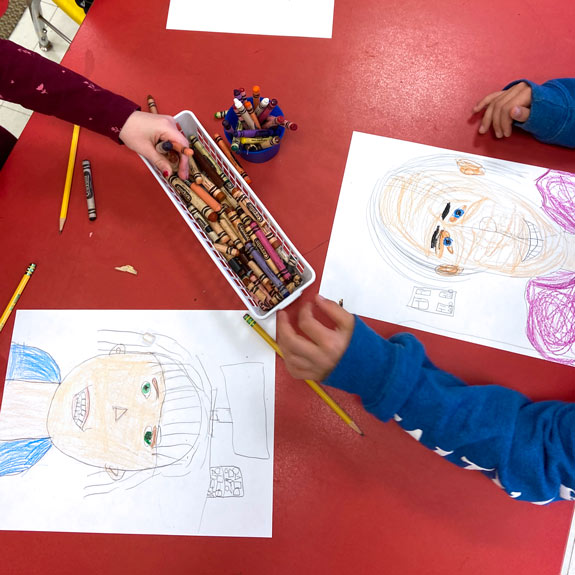Students used a range of colors to thoughtfully capture their partner's skin tones