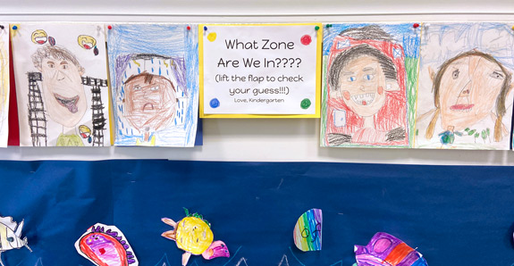 An interactive hallway exhibit prompts viewers to guess each portraitʼs emotion