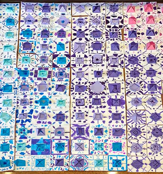 Second-through fifth-graders created individual paper mosaic tiles for this large-scale installation.