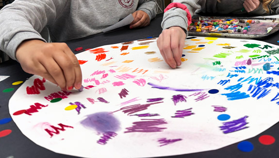 A student examines color theory
