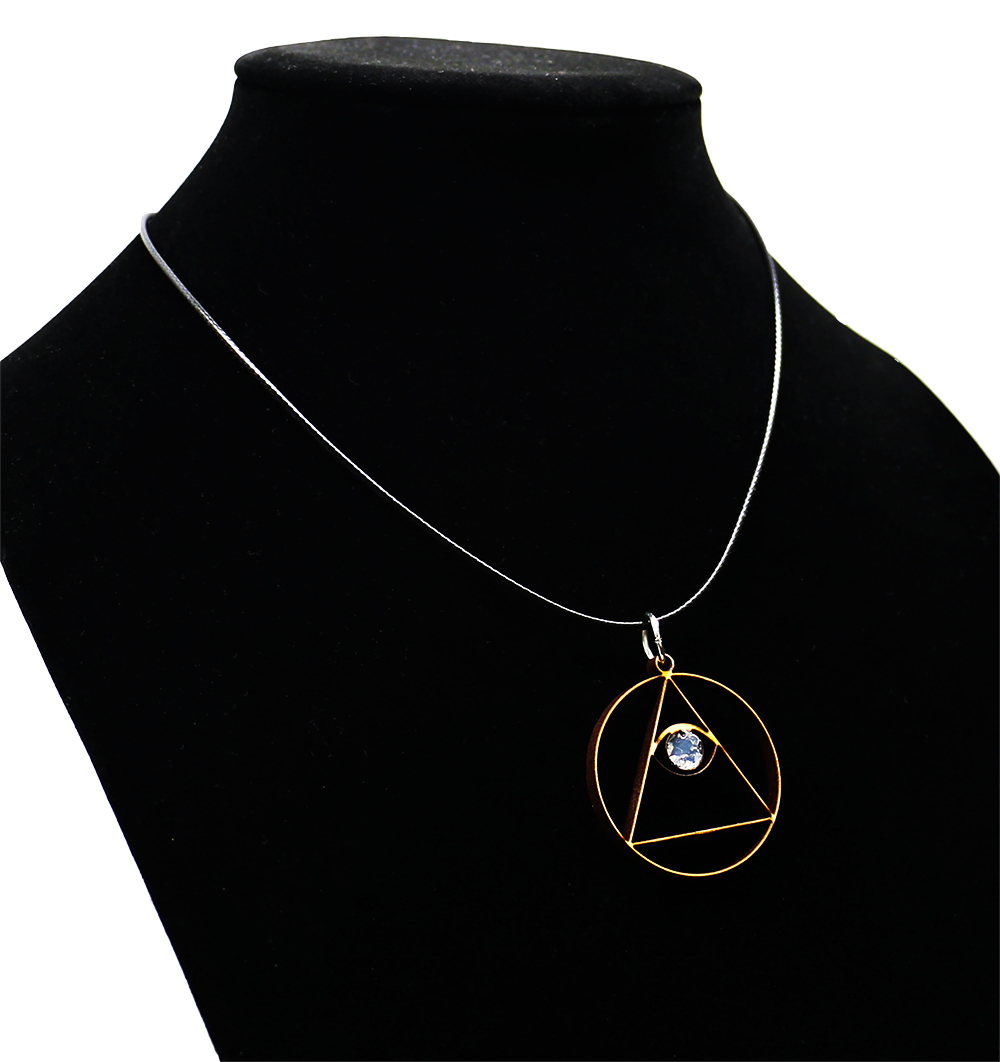 Student artwork of a pendant featured in the middle-school art lesson about laser-cutter design.