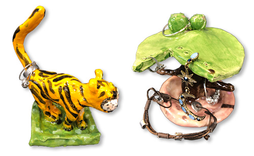 Clay sculptures that double as holders for jewelry and other items.