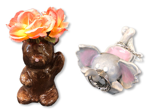 Clay sculptures that double as holders for jewelry and other items.