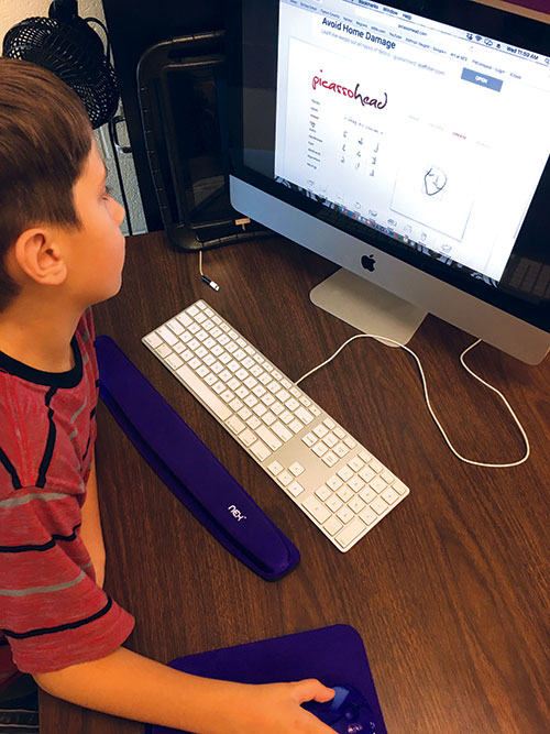 Student using Picassohead